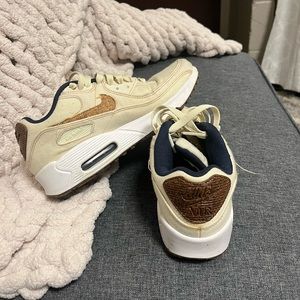 beige embroidered nikes!